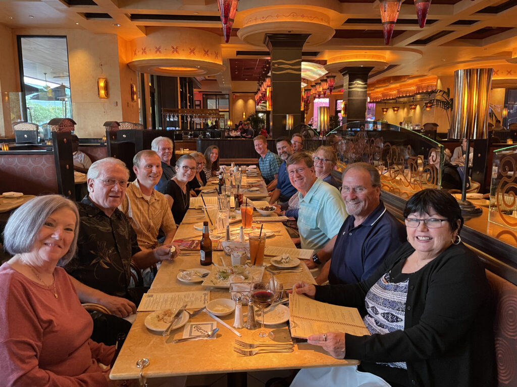 Photo of the Gentry Professional Services team and employees having dinner together at a restaurant.